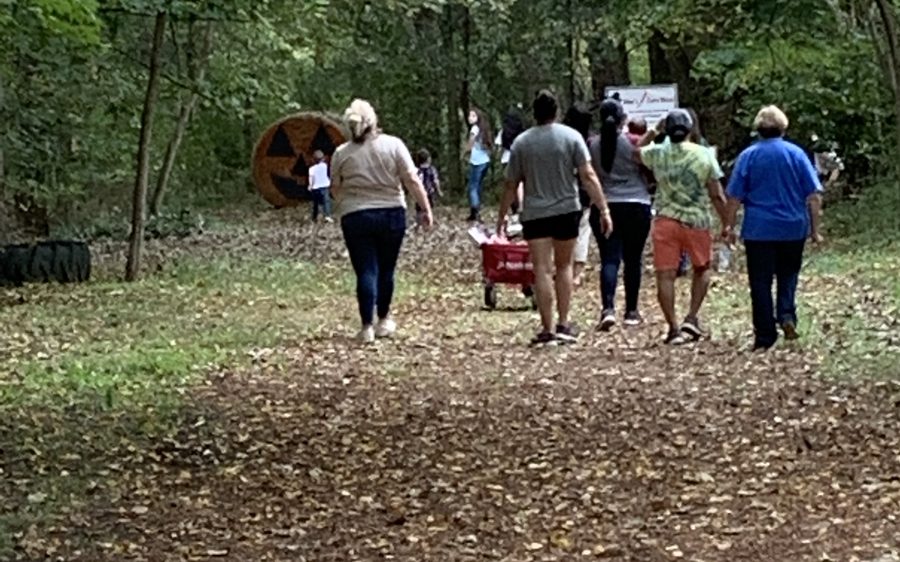 Visitors walking the Pumpkin Parable nature trail